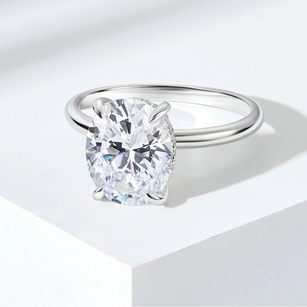 SOLD $210 3 Carat Oval Simulated Diamond .925 Sterling Silver with Hidden Halo